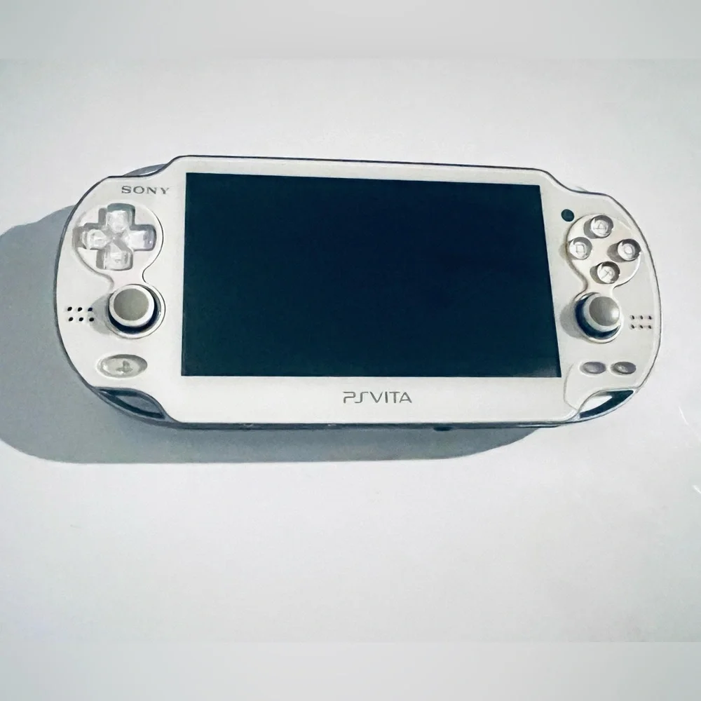 Sony PS Vita White Handheld Console Comes With Charging And Sony SD 4 GB Or Bag